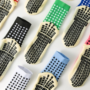 Professional anti-slip soccer socks with silicone grip pads available in multiple colors