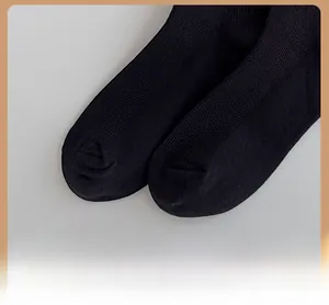 Close-up of reinforced sock toe featuring durable ribbed knit texture in black
