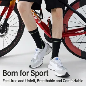 Men's cycling socks in black and neon green for professional athletic compression