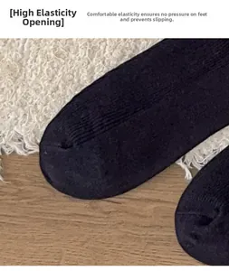 Détail de bas en dentelle noire haute élasticité avec bord-côte antidérapant
