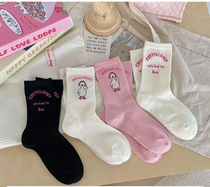 Pink and white cotton socks featuring cute cartoon ducks and varsity style embroidery
