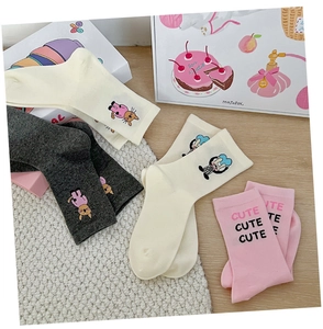 Close-up of cute cartoon cat and bunny patterned cotton mid-calf socks for women