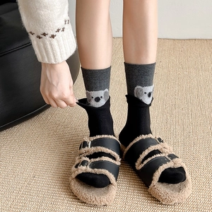 Chic layered gray mid-calf socks with koala cartoon and plush black double-buckle sandals