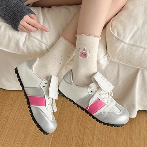 Chic women's polka dot socks with cartoon cat embroidery and wavy edges with sneakers