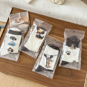 Four pairs of cute dachshund pattern cotton socks in retro brown and beige tones