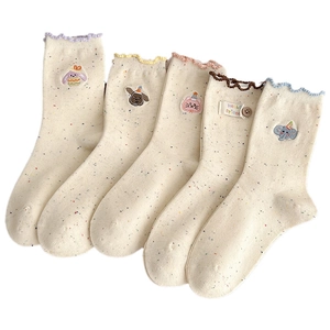 Five pairs of animal-embroidered crew socks with colorful flecks and wavy ruffle cuffs