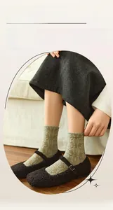 Detail of vintage palace style mid-calf socks with 3D embossed floral patterns on feet