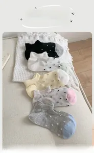 Detail of five-pair set mesh breathable cotton boat socks with colorful polka dots