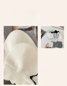 Detail of breathable knit texture and striped patterns on cotton ankle socks for women