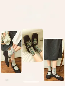 Detail of vintage floral crew socks with relief patterns and double needle weaving
