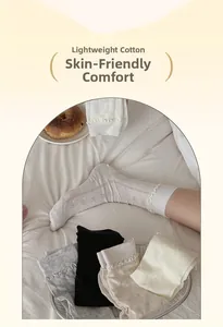 Detail of ruffle cuffs on breathable cotton mesh socks in various neutral colors