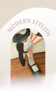 Detailed macro view of vintage floral socks with elastic cuffs and blue cotton fabric