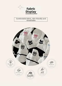 Details von weißen Baumwollsocken mit süßer Tierstickerei und atmungsaktiver Netzstruktur