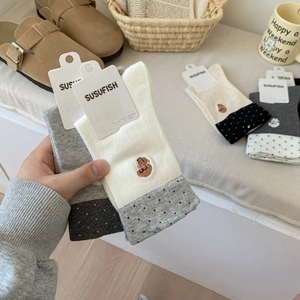 Cozy women's cotton socks with cute bear embroidery and stylish black polka dot patterns