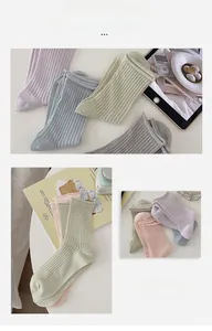 Detailed view of macaron colored ribbed crew socks with stylish rolled edge finish