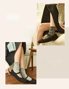 Detail of vintage floral pattern crew socks styled with brown Mary Jane shoes