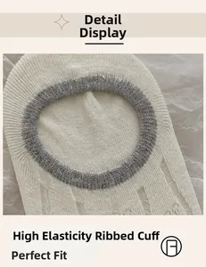 Close-up of high-elasticity ribbed cuffs on white and gray mesh low-cut boat socks