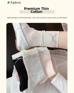Detail of breathable mesh crew socks with leather bow ties in multiple color options