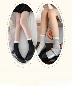 Detailed mesh knit socks with bow accent and Mary Jane shoes in a dual frame view