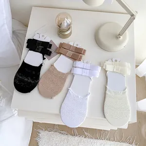 Set of 4 ballet style lace no-show socks with ribbon bows in black, camel, and white