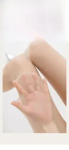 Close-up of sheer breathable skin-colored tights showing fabric stretch and texture
