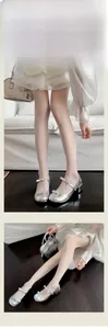 Macro detail of elastic sheer nude tights paired with silver bow Mary Jane shoes