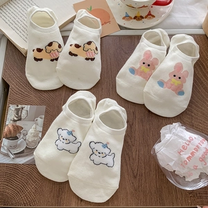 Three pairs of cream-colored low-cut cotton socks with cute cartoon animal patterns