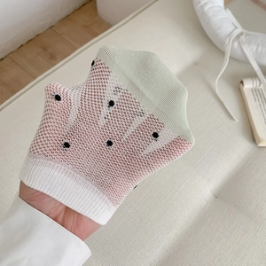 Breathable white mesh ankle socks with black polka dots and light green ribbing cuff