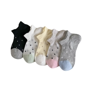 Five pairs of breathable mesh ankle socks with polka dots and contrasting colors
