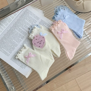 Women's ruffle trim mid-calf socks with plaid bow details in blue, pink and beige
