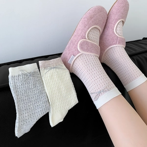 Women's mesh crew socks with leather bow detail and color block design in学院 style
