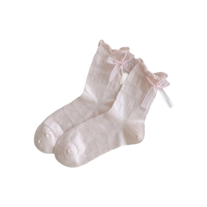 Pink mesh crew socks for girls with ruffle cuffs and decorative side ribbon bow