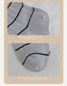 Detail of grey striped socks showing the reinforced heel and seamless toe design