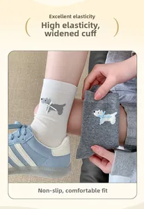Detail of high-elastic widened cuffs and cute dog embroidery on rib-knit mid-calf socks