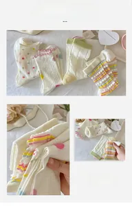 Detail of colorful polka dot and ruffled cotton socks with delicate jacquard textures