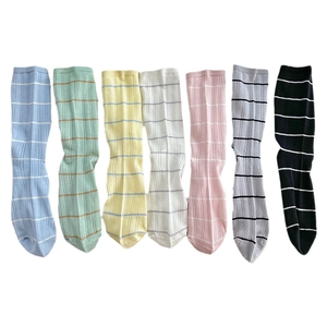 Set of 7 pastel striped cotton socks with mesh knit texture in various soft colors