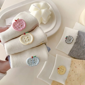 Cozy cotton knit crew socks for women featuring cute apple-shaped plaid buttons set