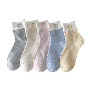 Set of 5 colorful speckled cotton crew socks with apple buttons and ribbed cuffs