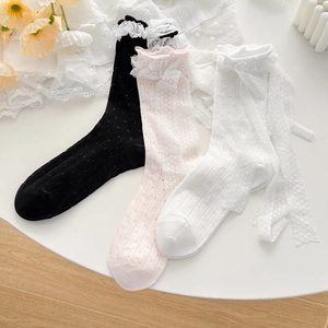 Sweet Lolita lace crew socks with ribbon and polka dot patterns in black, pink, and white