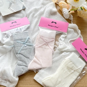 Lace hollow knee high socks with bow and button details in pink, grey and white colors