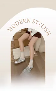 Close-up of light beige ribbed crew socks featuring balletcore bow embroidery detail