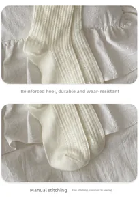 Détail de chaussettes avec talon stéréo et pointe renforcée par couture manuelle