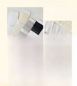 Close-up of four colors breathable mesh hollow lace crew socks in combed cotton material