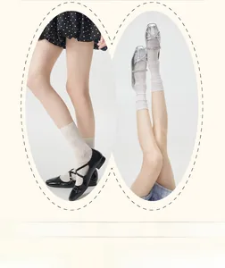 Detail of cream white mesh lace socks with sweet floral hollow patterns for women