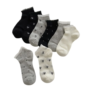 Lace ruffle ankle socks set with polka dots and black bows in white, grey, and black