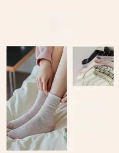 Close-up of breathable mesh fabric and colorful striped patterns on these women's crew socks