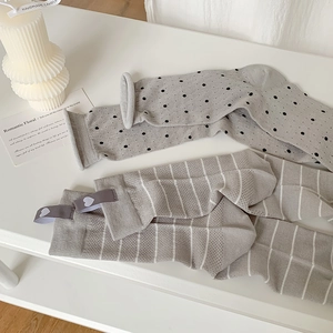 Minimalist grey cotton crew socks with polka dots and stripes, Japanese style aesthetic