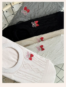 Detail of five pairs of cotton low-cut socks with strawberry and bow embroidery