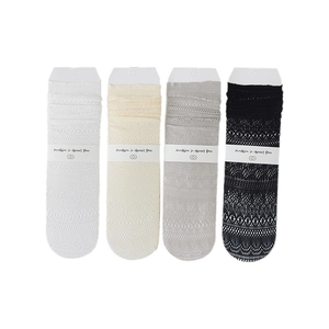 Set of four mesh lace slouch socks for women with floral hollow patterns in neutral colors