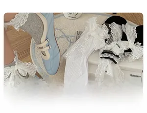 Detail of sweet lolita style socks with lace ruffles and bowknots in four colors